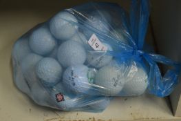 A quantity of golf balls.