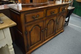 A good reproduction oak dresser base.