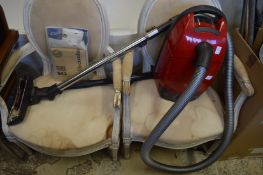 A Miele cat and dog vacuum cleaner.