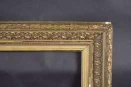 A FRENCH SLOPE 4.25INS GILTWOOD PICTURE FRAME. Rebate size 14.5ins X 24ins