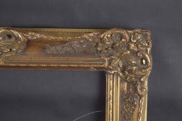 A GILT PICTURE FRAME Rebate size 21.5ins x 11.75ins