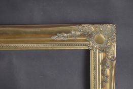 A GILT PICTURE FRAME Rebate size 20ins x 30ins.