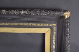 A BLACK REEDED FRAME with Greek key pattern. Rebate size 20ins x 27ins