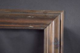 A PLAIN WOODEN PICTURE FRAME Rebate size 11.75ins x 15.75ins