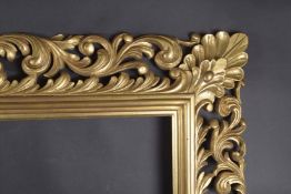 A GOOD CARVED FLORENTINE GILTWOOD PICTURE FRAME. Rebate size 24inx x 42ins.