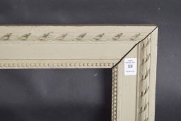 A PALE WASH WOODEN PICTURE FRAME Rebate size 15ins x 21ins.