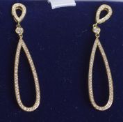 A PAIR OF 18CT GOLD DIAMOND DROP EARRINGS