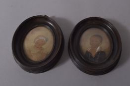A PAIR OF 19TH CENTURY OVAL PORTRAIT MINIATURES ON PAPER OF A BOY AND GIRL. 4.25ins x 3.75ins.