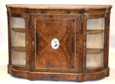 A GOOD VICTORIAN BURR WALNUT AND ORMOLU CREDENZA, the central panelled door mounted with an oval