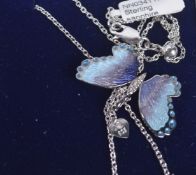 A STERLING SILVER AND ENAMEL BUTTERFLY PENDANT.