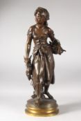 AUGUSTE MOREAU. A GOOD BRONZE OF A GIRL carrying a basket and a cockerel. Signed. 24ins high on a