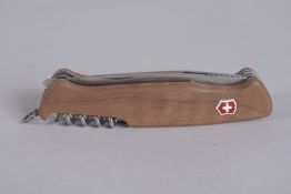A SWISS MADE DULEMONT 4 PIECE FOLDING KNIFE. 5ins long.