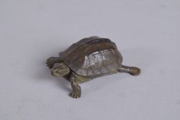 A JAPANESE ARTICULATED BRONZE TORTOISE. 2ins long