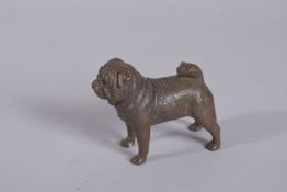 A BRONZE PUG DOG.