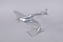 A CHROME SPITFIRE. 8ins high.