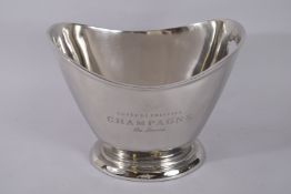 A SILVER PLATED CHAMPAGNE, TWO HANDLED OVAL COOLER. 10ins high, 14ins wide.