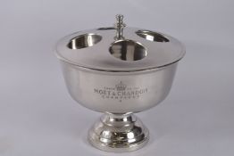 A MOET CHANDON FOUR BOTTLE WINE COOLER AND COVER. 15ins high x 14ins diameter.