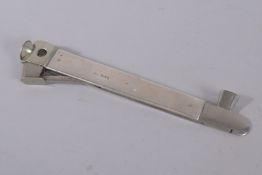 A LARGE SILVER MOUNTED CIGAR CUTTER. 8.5ins long.
