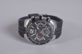 A SEKONDA 100 METAL WRIST WATCH with black strap.