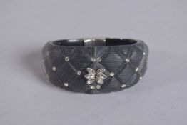 AN ALEXIS BITTAR HAND CRAFTED BANGLE with oval name plate. 8cm.