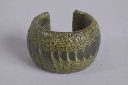 A COOKOO MOMENT VINTAGE CROCODILE SKIN BANGLE. 8cm diameter.