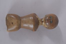 AN EARLY CARVED WOOD AND PAINTED 