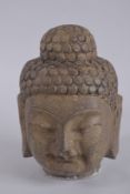 A STONE BUDDHA HEAD. 9.5ins high.