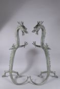 A VERY LARGE PAIR OF BRONZE DRAGONS. 36ins high.