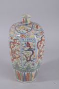 A CHINESE WUCAI PORCELAIN DRAGON VASE. 36cms high.