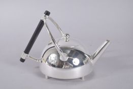 A CHRISTOPHER DRESSER DESIGN CIRCULAR SILVER PLATED TEA POT.