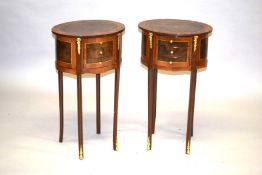A PAIR OF LOUIS XVI DESIGN OVAL BEDSIDE TABLES with three drawers, on slender curving legs. 2ft 3ins