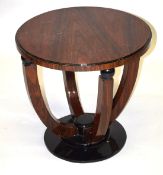 AN ART DECO DESIGN DARK WOOD CIRCULAR TOP TABLE with curving legs. 1ft 2ins high x 1ft 11ins