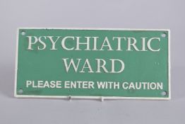 A GREEN AND WHITE CAST IRON PSYCHIATRIC SIGN. 5ins x 11ins.