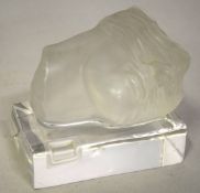 A DAUM FRANCE GLASS MASK on a plain stand. No. 804/2000. Etched Daum. 3ins high.