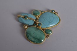 A DIOR MALACITE AND GILT METAL BANGLE. Dior stamp.