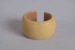 COOKOO MOMENT A VINTAGE TAN LEATHER BRACELET, signed, 2.5ins.