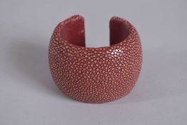 COOKOO MOMENT A VINTAGE RED LEATHER BRACELET, signed, 2.5ins.