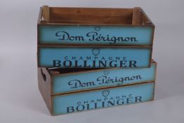 A PAIR OF WOODEN CHAMPAGNE BUCKETS. 17ins long.