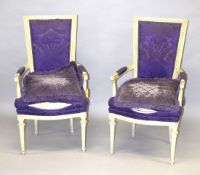 A PAIR OF WHITE PAINTED PURPLE ARMCHARS.