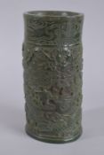A LARGE CHINESE CARVED JADE BRUSH POT with dragons and scrolls. 10ins high x 4.25ins diameter.