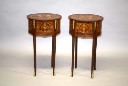 A PAIR OF LOUIS XVI DESIGN OVAL INLAID BEDSIDE TABLES with three drawers, on slender curving legs.