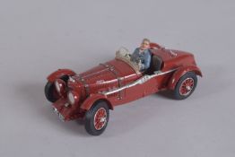 A KING AND COUNTRY ASTON MARTIN with driver.