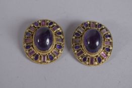 PERCOSS IPAPI A PAIR OF BLUE STONE EAR CLIPS, signed.