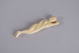 A BONE CARVED DOCTOR'S MODEL. 5ins long