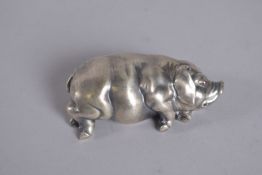 A RUSSIAN SILVER SLEEPING PIG. Mark, head 84 I P , Faberge. 2.5ins long 41gms.