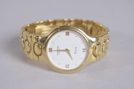 A RAYMOND WEIL TOSCA WRIST WATCH with gilt metal bracelet.