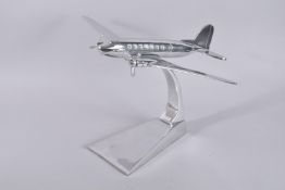 A LARGE CHROME DAKOTA PLANE. 13ins high.