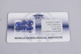 A CERTIFIED AND SECURITY SEALED PARCEL OF 6 OVAL CABOCHON DEEP BLUE SAPPHIRES. 19.16ct.