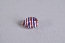 A 14CT GOLD STRIPED EGG PENDANT.