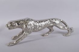 A LARGE SILVERED LEOPARD. 28ins long.